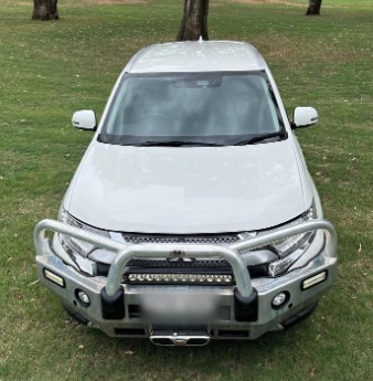 Mitsubishi Outlander 4WD wagon with bullbar and light bar
